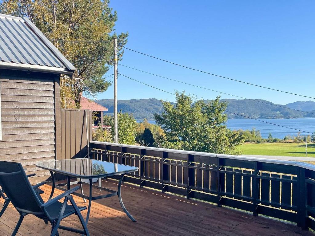 a patio with a table and chairs on a deck at 3 person holiday home in Frei-By Traum in Frei