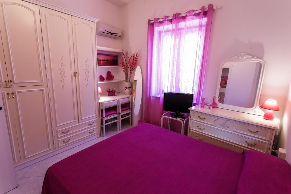 Postel nebo postele na pokoji v ubytování L'Aurora Viola