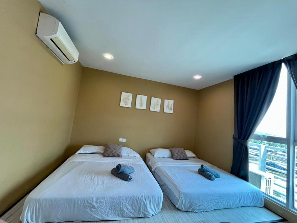 Postel nebo postele na pokoji v ubytování SUTERA AVENUE 6 PAX B602A by GC near imago kk