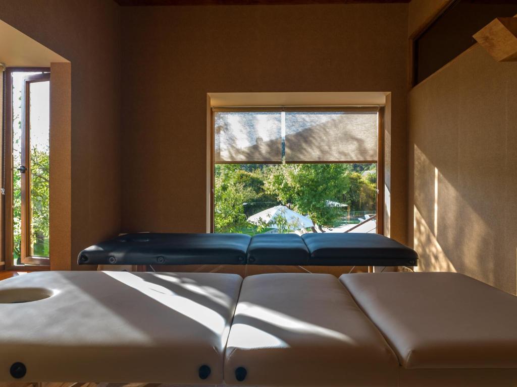 Postel nebo postele na pokoji v ubytování Olmue Natura Lodge & Spa