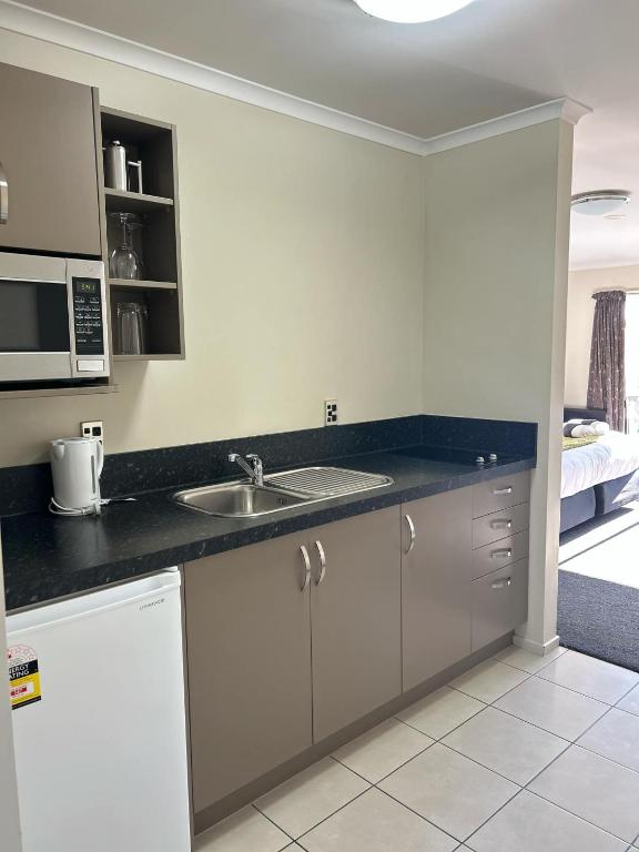 ASURE Avenue Motor Lodge - Resim 3