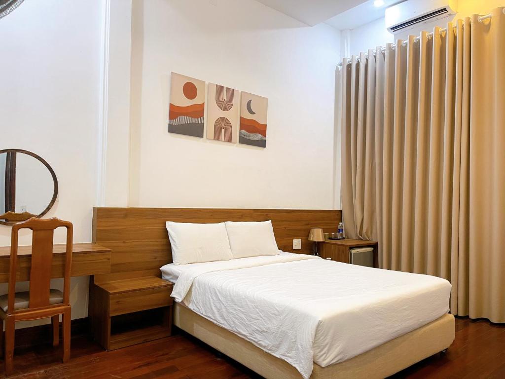 Ένα ή περισσότερα κρεβάτια σε δωμάτιο στο Ngoc Toan Retreat