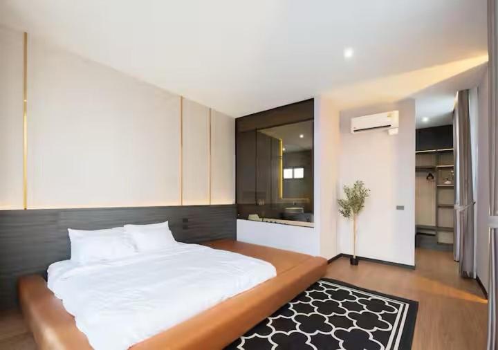 Postel nebo postele na pokoji v ubytování GOYO-AN FIVE-LEAF Hotel