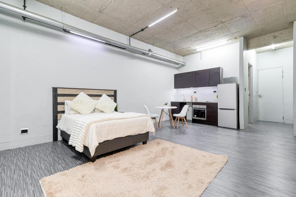 Postel nebo postele na pokoji v ubytování Escape to El&M