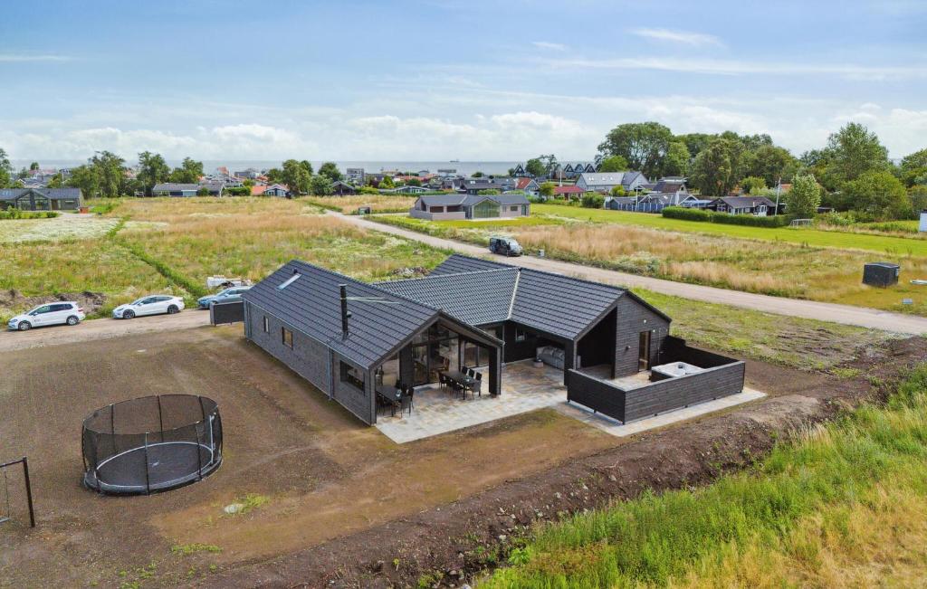 an overhead view of a house in a field at Nice Home In Otterup With Sauna in Otterup