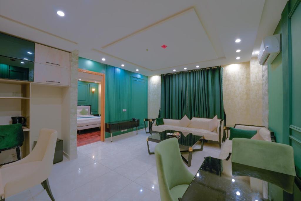 Χώρος καθιστικού στο MB Residencia Hotel Suites