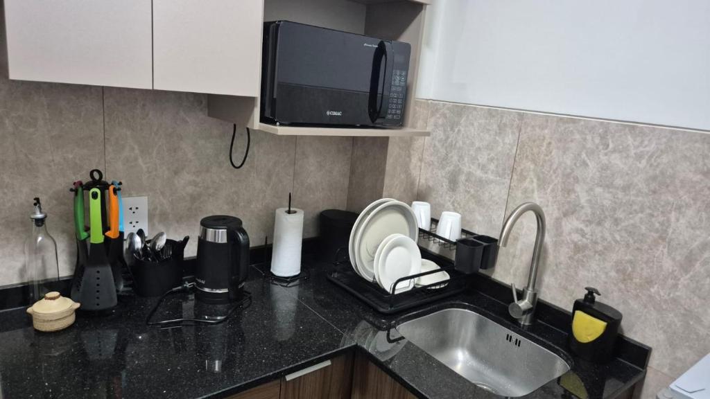 Kuchyň nebo kuchyňský kout v ubytování Monoambiente en sopocachi