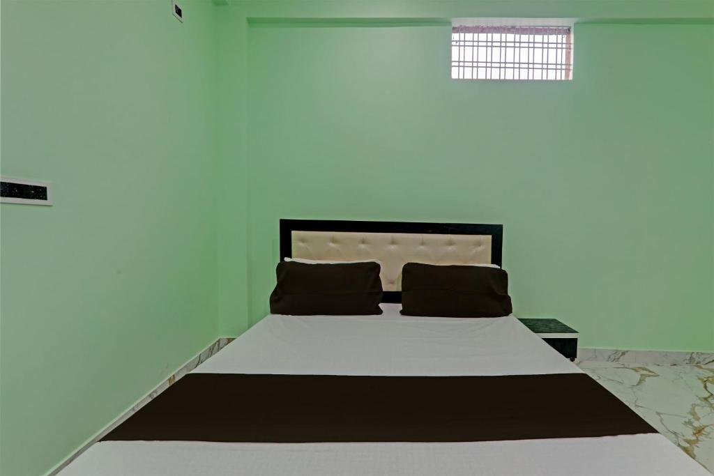 Giường trong phòng chung tại Hotel O WELCOME GUEST HOUSE