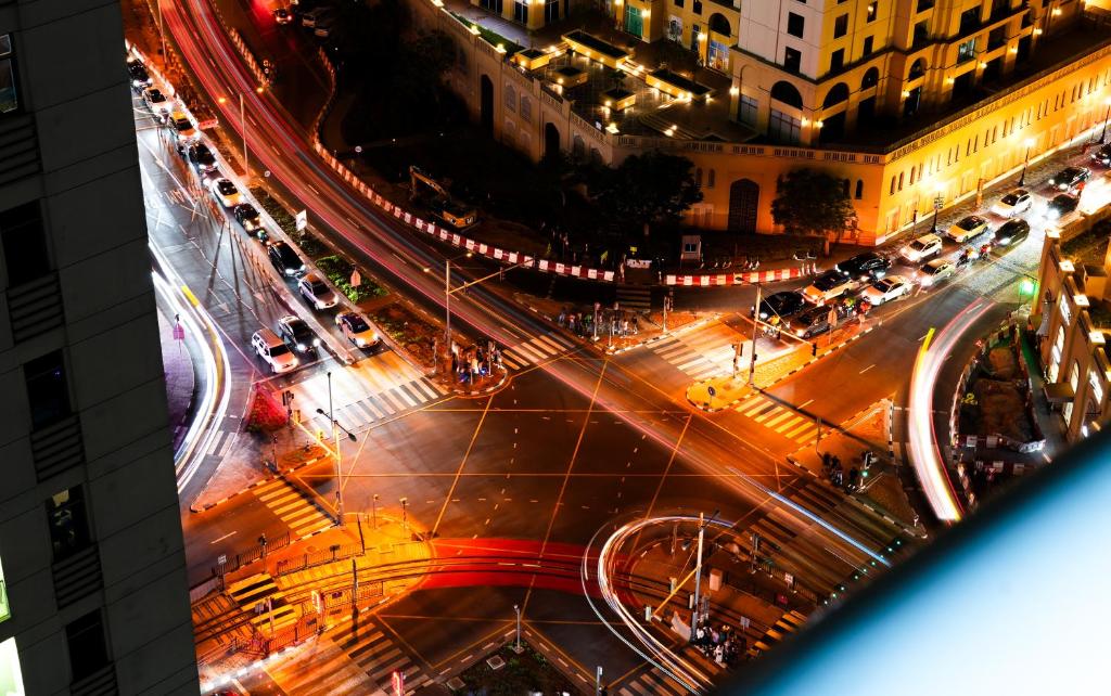 an overhead view of a busy city street at night at Superb Family Friendly Beach-Front Whole Flat, Great Views in Dubai