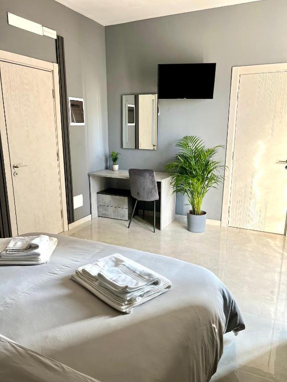 Postel nebo postele na pokoji v ubytování Room Reservations