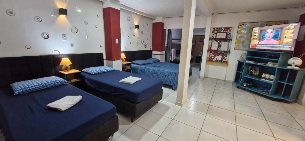 Ένα ή περισσότερα κρεβάτια σε δωμάτιο στο Suíte espaçosa na zona hoteleira da COP 30