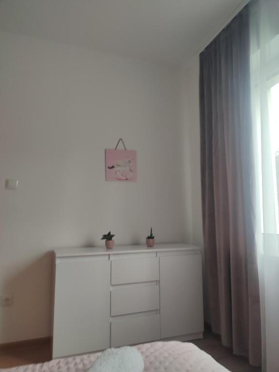 Postel nebo postele na pokoji v ubytování Apartamenty JULKA