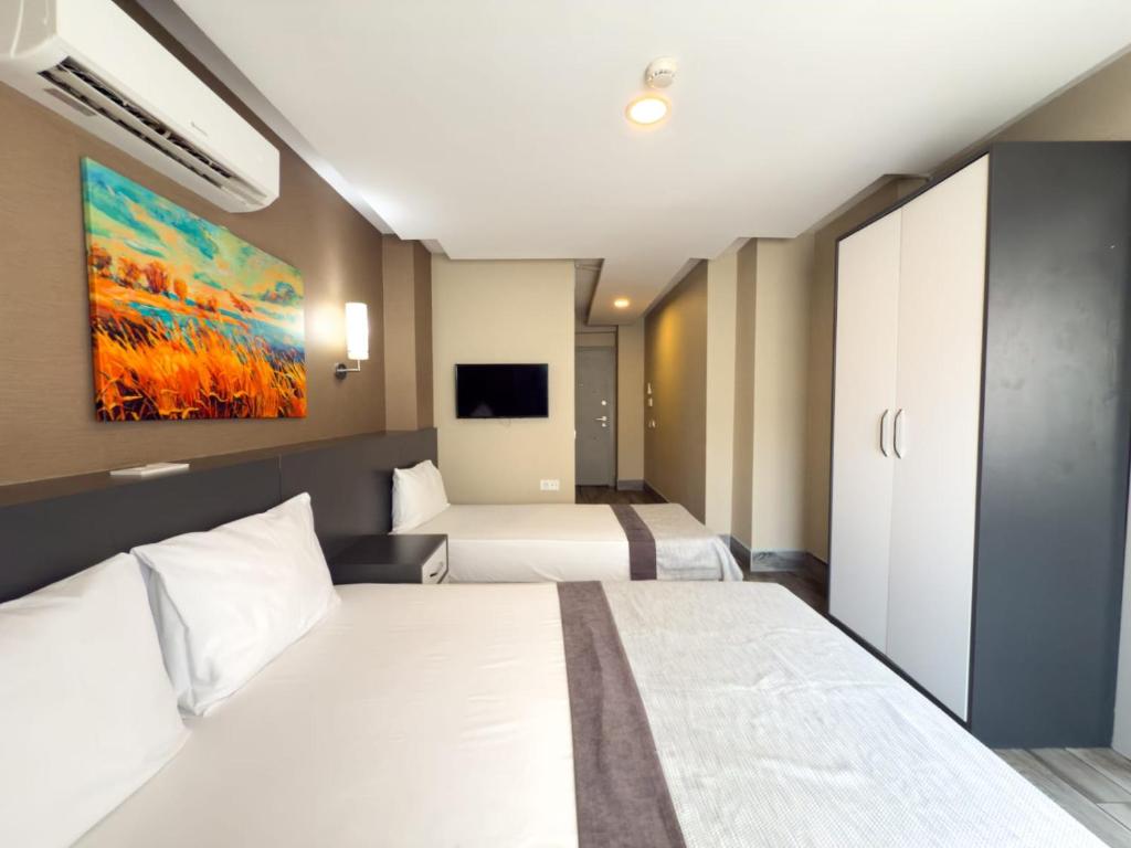 Postel nebo postele na pokoji v ubytování Bone Apart