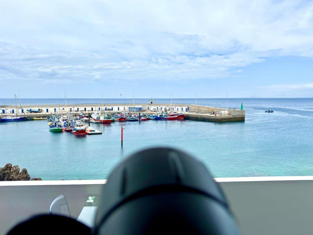 a view of a marina with boats in the water at Onyx apartment in Puerto del Carmen