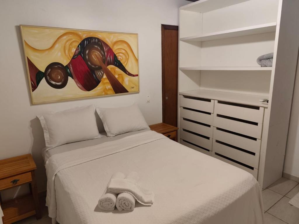 Postel nebo postele na pokoji v ubytování Suites na Casa das Conchas