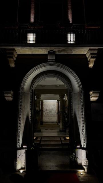 a hallway with an archway in a building at Villa Luisetta Palmi in Palmi