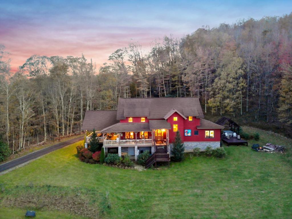 an aerial view of a house on a field at D-Coys Nest in Banner Elk