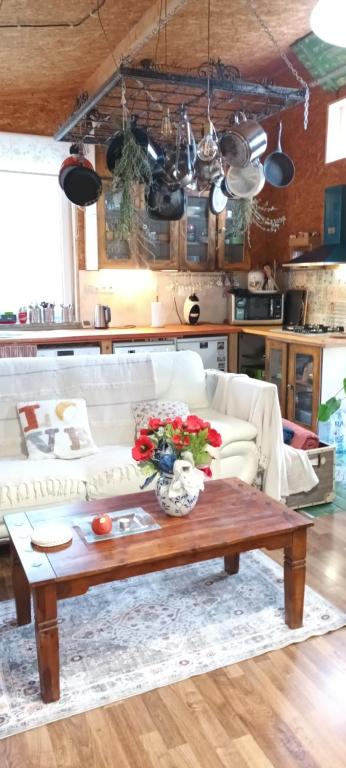 a living room with a couch and a coffee table at DVOR POD KRíKMI in Spišský Štvrtok