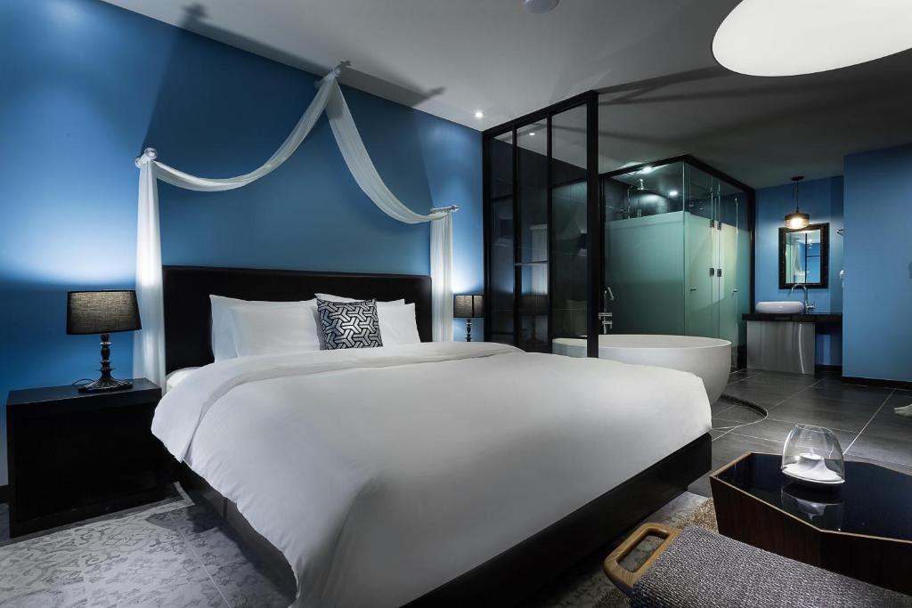 Postel nebo postele na pokoji v ubytování Hotel Sienna