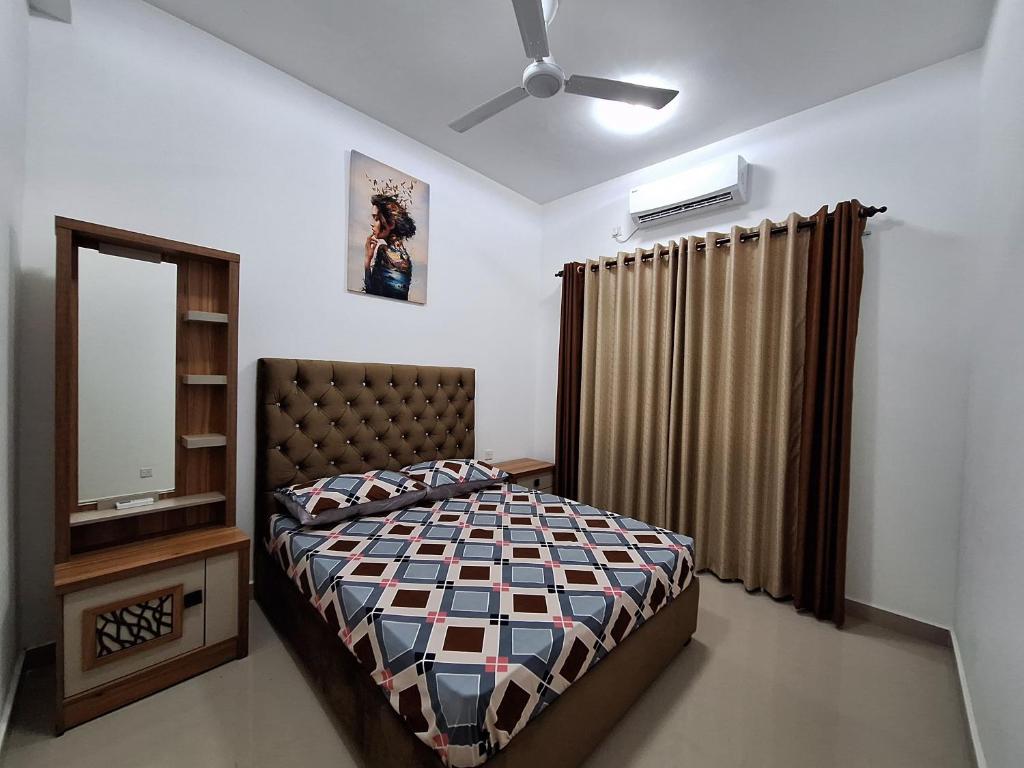 Ένα ή περισσότερα κρεβάτια σε δωμάτιο στο Canterbury Golf line Residence - The Luxurious stay