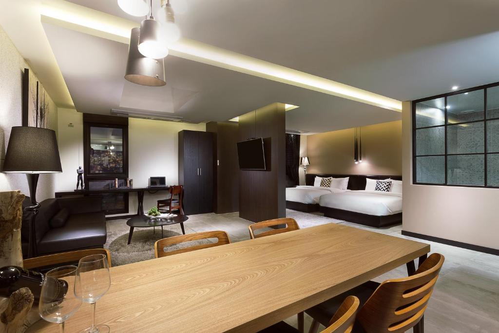 Postel nebo postele na pokoji v ubytování Hotel Sienna