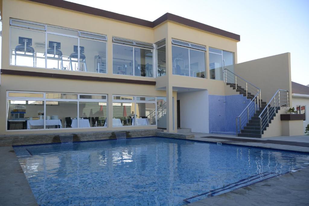 Bazén v ubytování Indico Apart Hotel nebo v jeho okolí