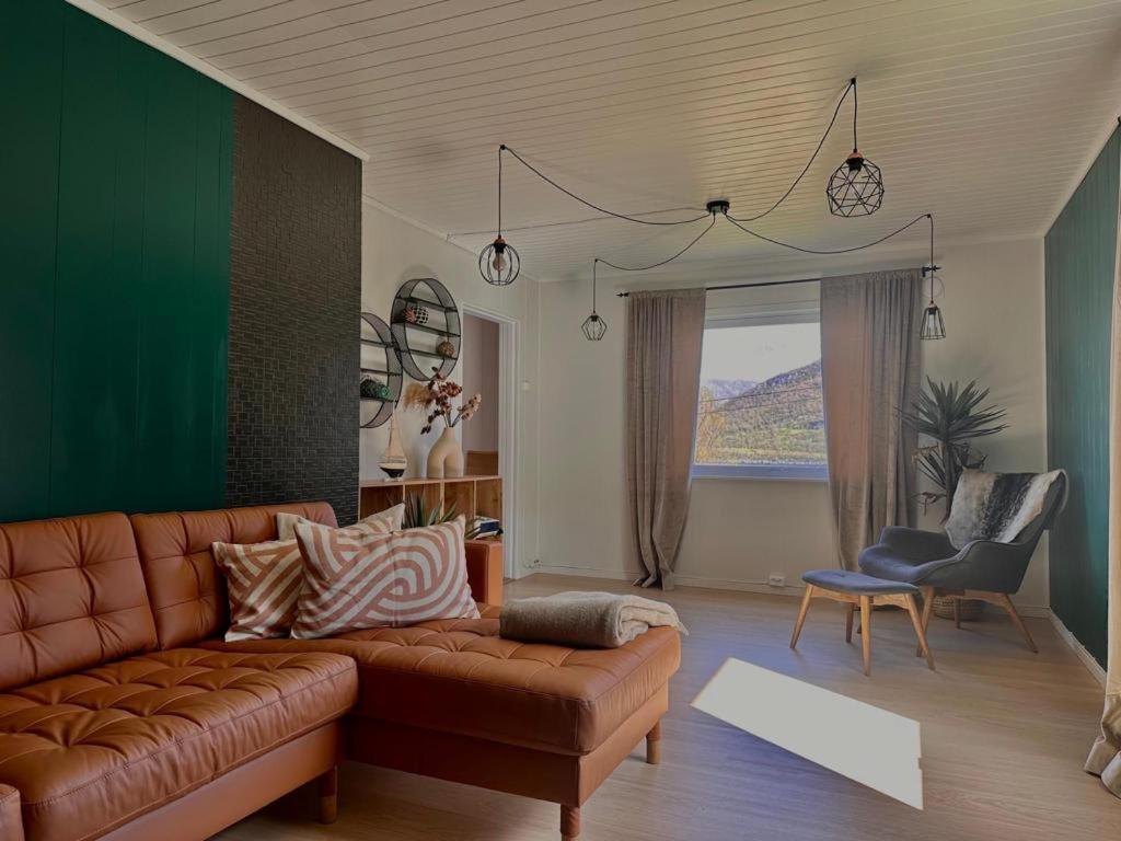 Posezení v ubytování Aurora Boutique Hut with private sauna