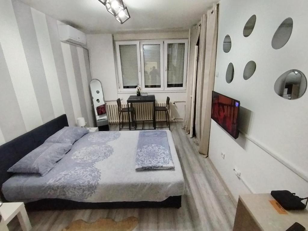 Ένα ή περισσότερα κρεβάτια σε δωμάτιο στο Studio apartman Nataly