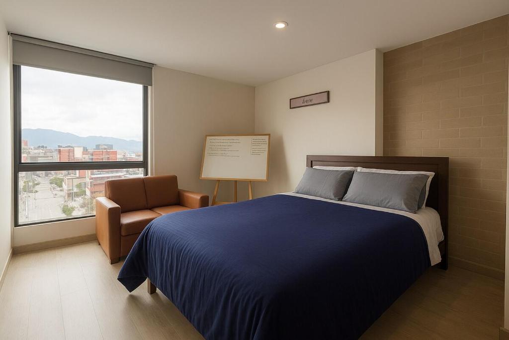 Giường trong phòng chung tại Modern studio apartment, comfortable, strategic location