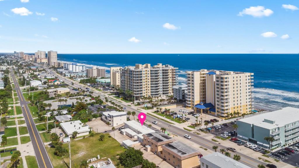 an aerial view of a city with the ocean at Atlantic Shores Motel in Daytona Beach