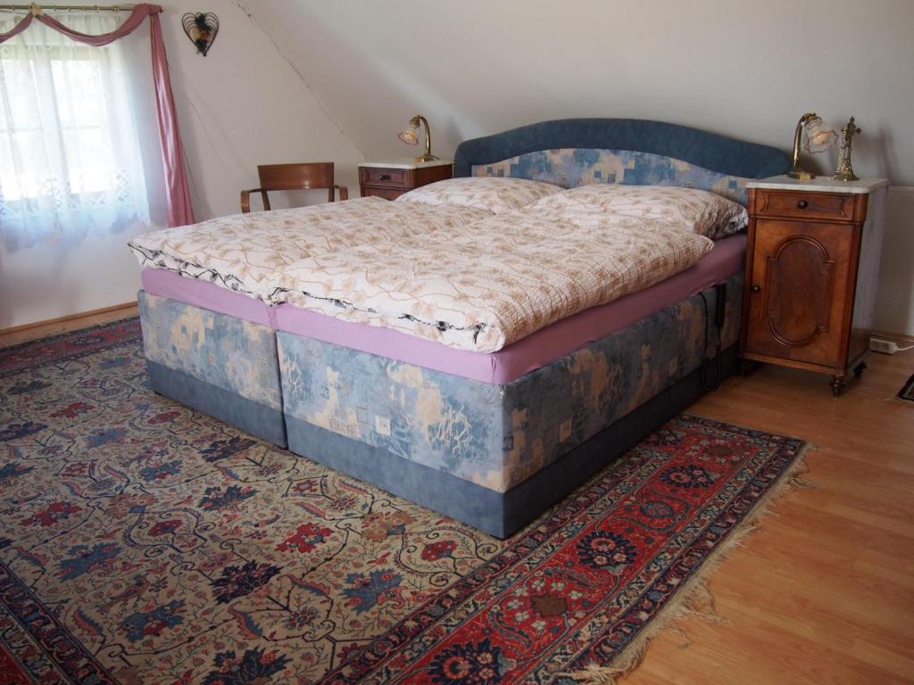 Postel nebo postele na pokoji v ubytování Kopaniny