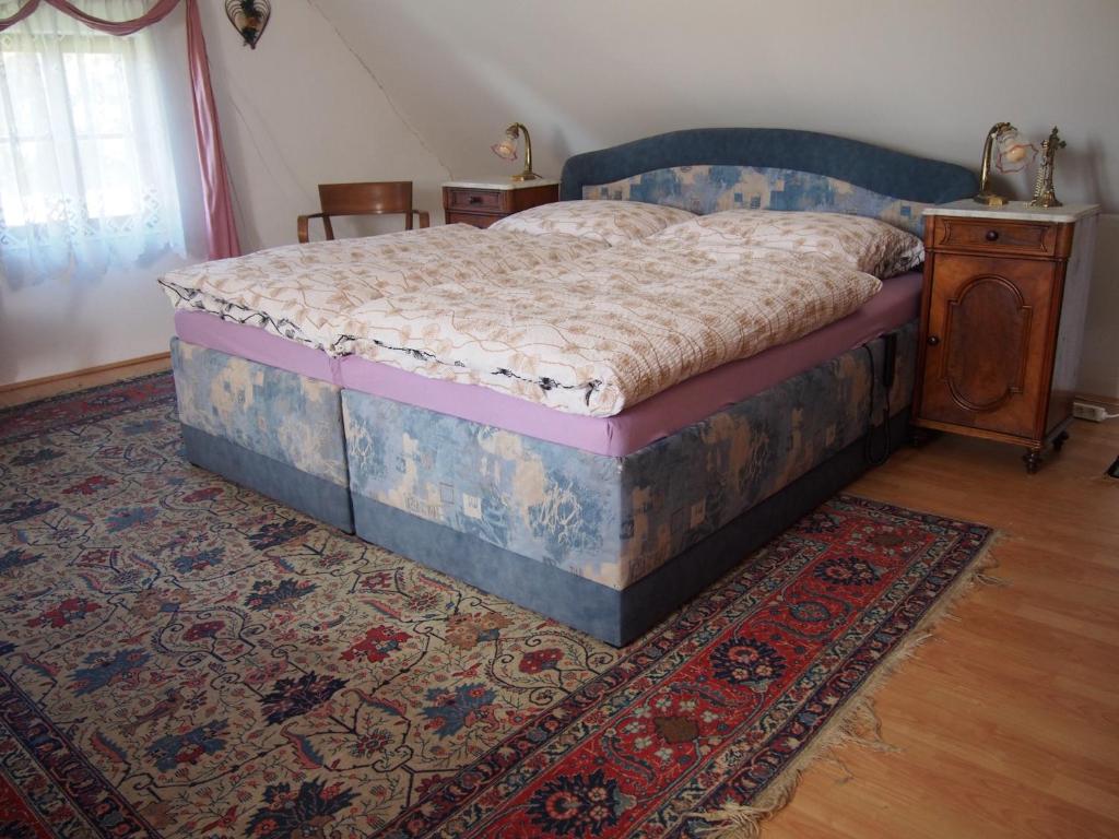 Postel nebo postele na pokoji v ubytování Kopaniny