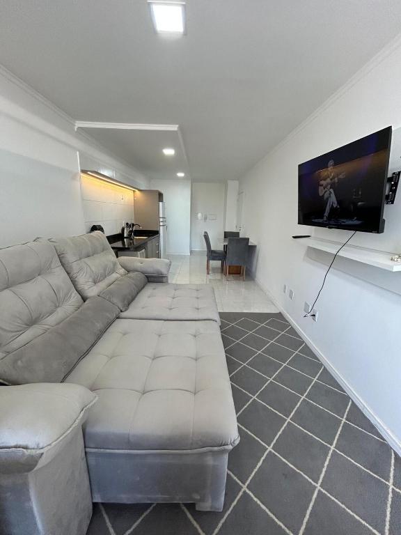 Μια τηλεόραση ή/και κέντρο ψυχαγωγίας στο Loft moderno e completo a 200m do Consulado Americano