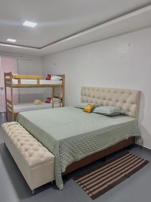 Postel nebo postele na pokoji v ubytování Hostel Banzeiro