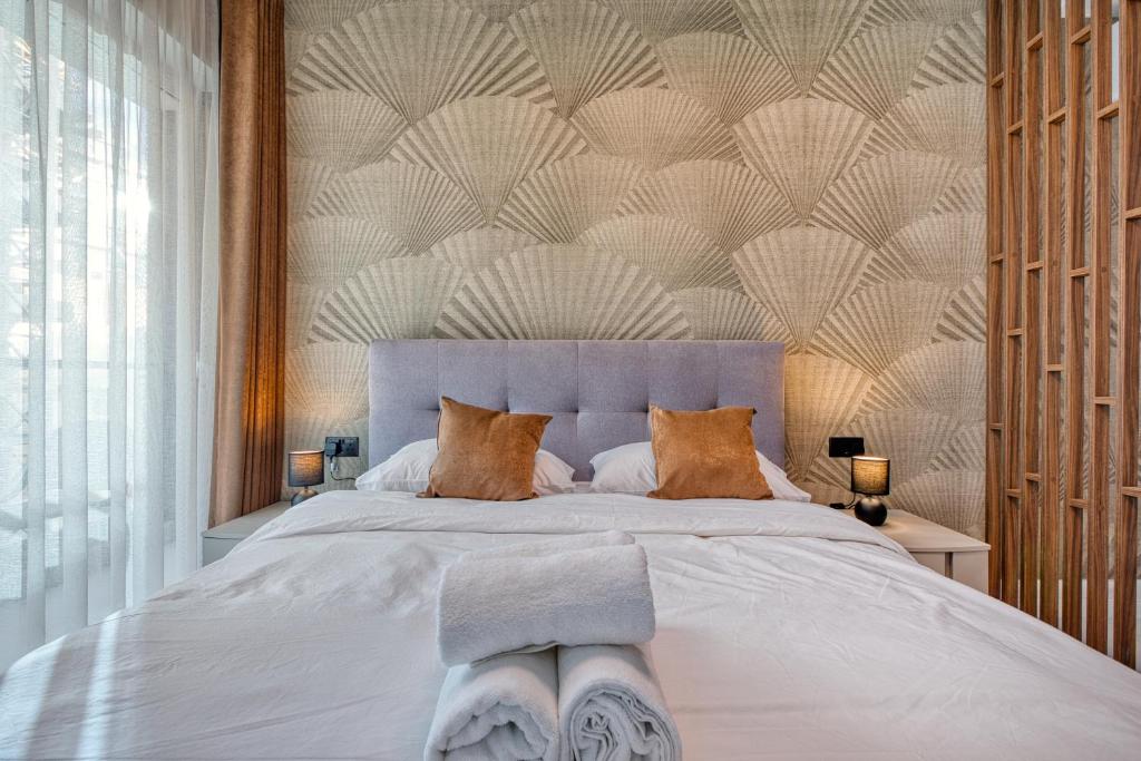 Postel nebo postele na pokoji v ubytování Cosy Suite Saint Julians