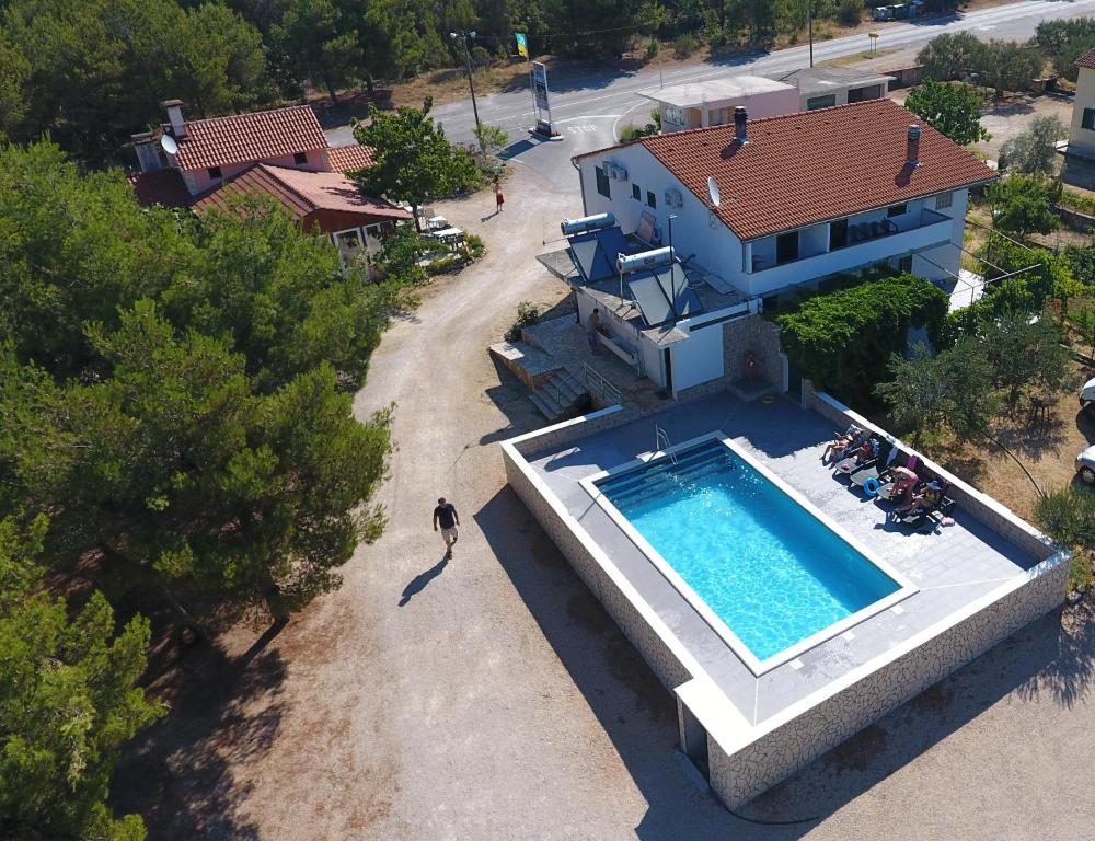 an overhead view of a house with a swimming pool at Camp Krka in Lozovac
