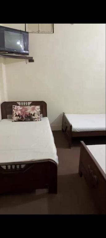 Postel nebo postele na pokoji v ubytování Jalil Hotel & Restaurant