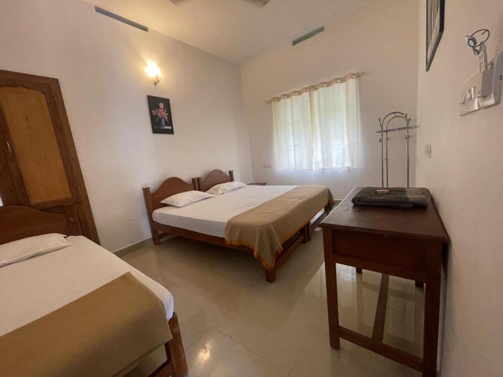 Postel nebo postele na pokoji v ubytování Bon Voyage Signature Holidays