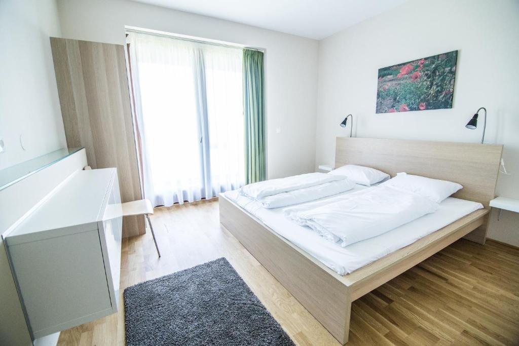 Postel nebo postele na pokoji v ubytování Öregtölgy Vendégház