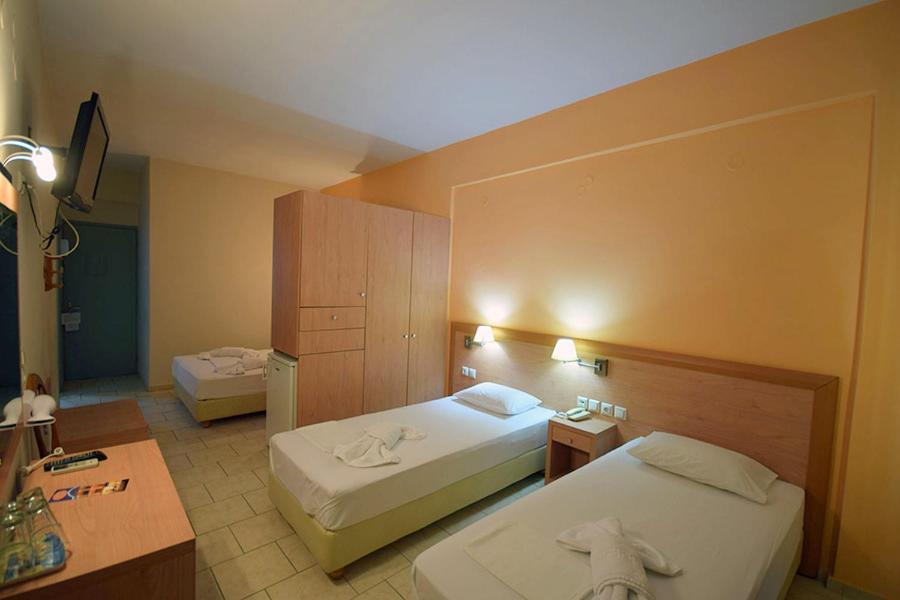 Postel nebo postele na pokoji v ubytování Plaz Hotel