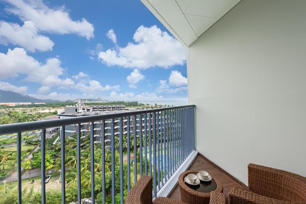 Premier King Room with Balcony and Partial Sea View