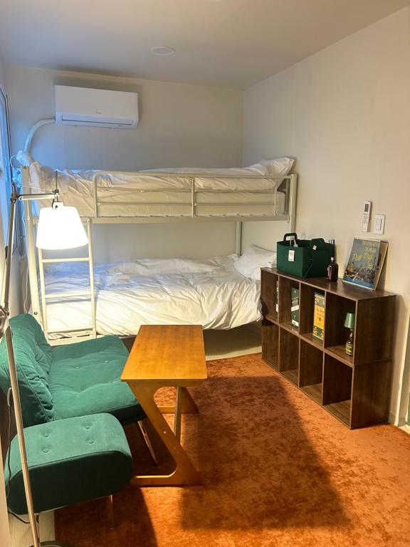 Ένα ή περισσότερα κρεβάτια σε δωμάτιο στο Pocket Seoul Branch 2