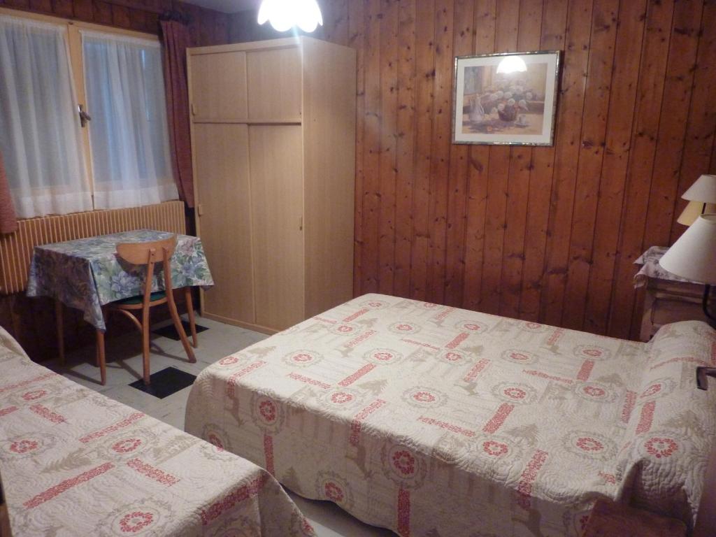Postel nebo postele na pokoji v ubytování Chalet Le Starfu