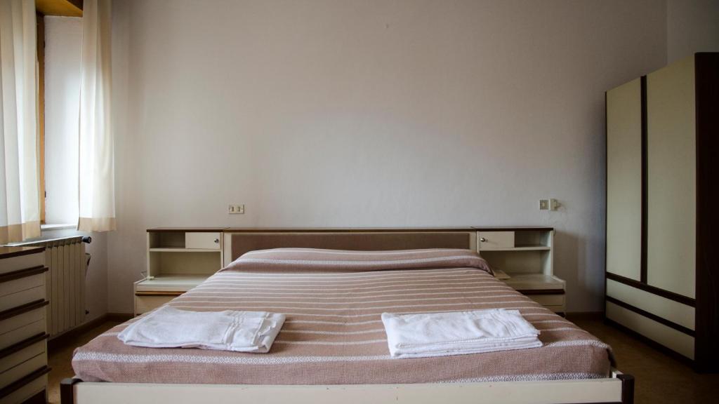 Postel nebo postele na pokoji v ubytování Stella d'Oro