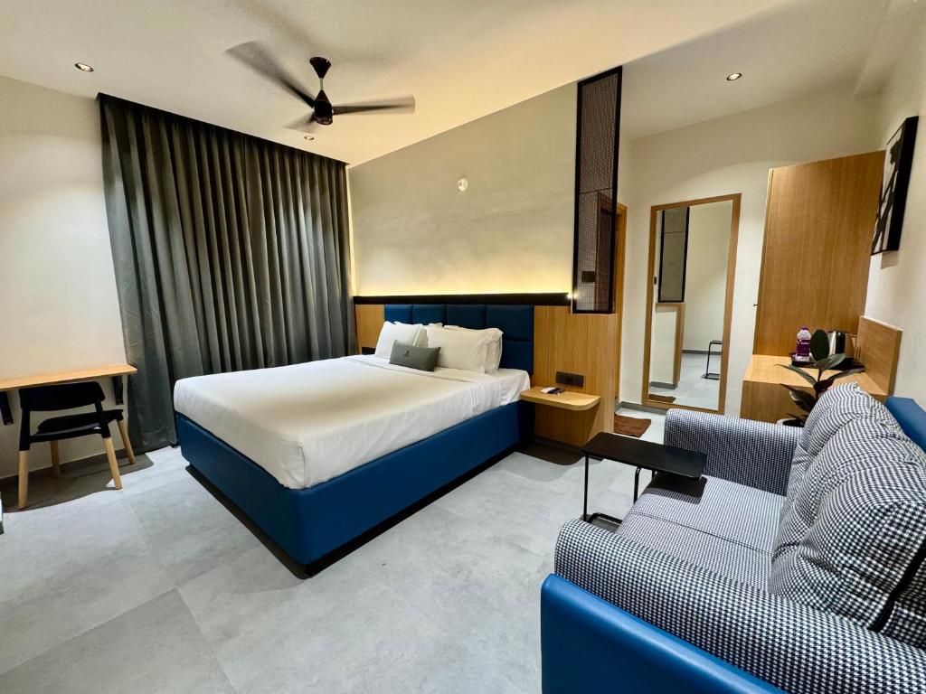 Postel nebo postele na pokoji v ubytování Kaysons hotel