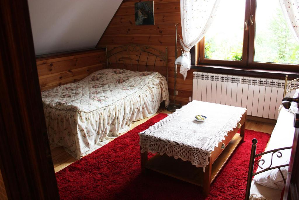 Postel nebo postele na pokoji v ubytování Pokoje Kaja