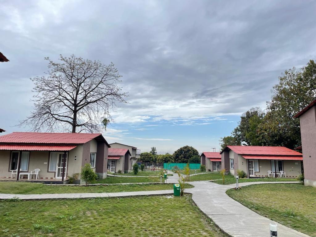 a row of houses with red roofs at Big Mama Corbett in Belparāo
