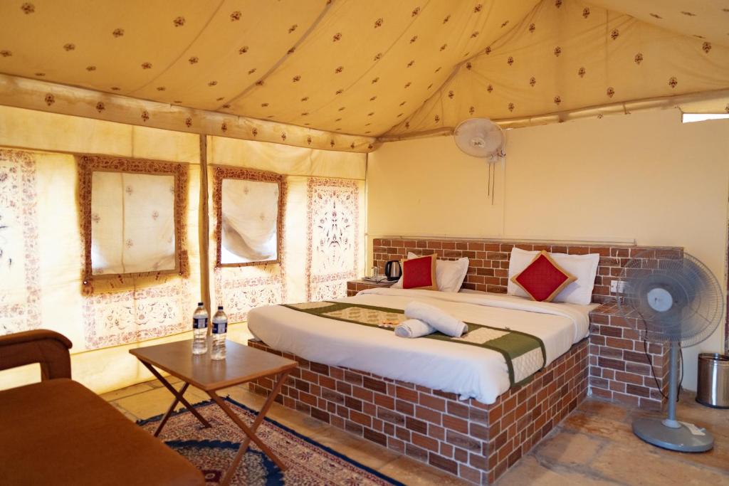 Ένα ή περισσότερα κρεβάτια σε δωμάτιο στο Rumis Desert Camp