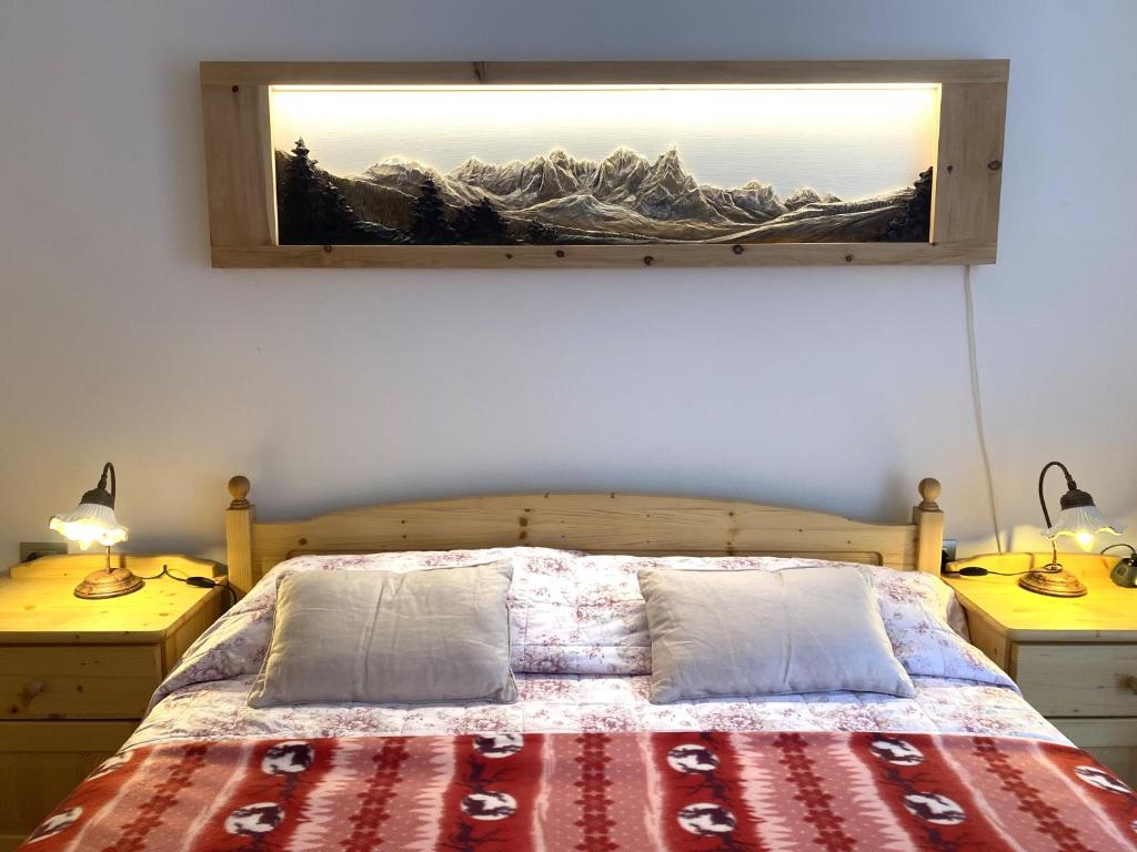 Ένα ή περισσότερα κρεβάτια σε δωμάτιο στο Appartamento LatteMiele