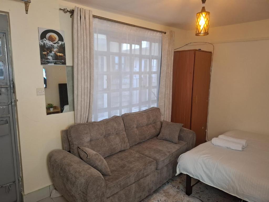 Posezení v ubytování Pinban Studio Utawala